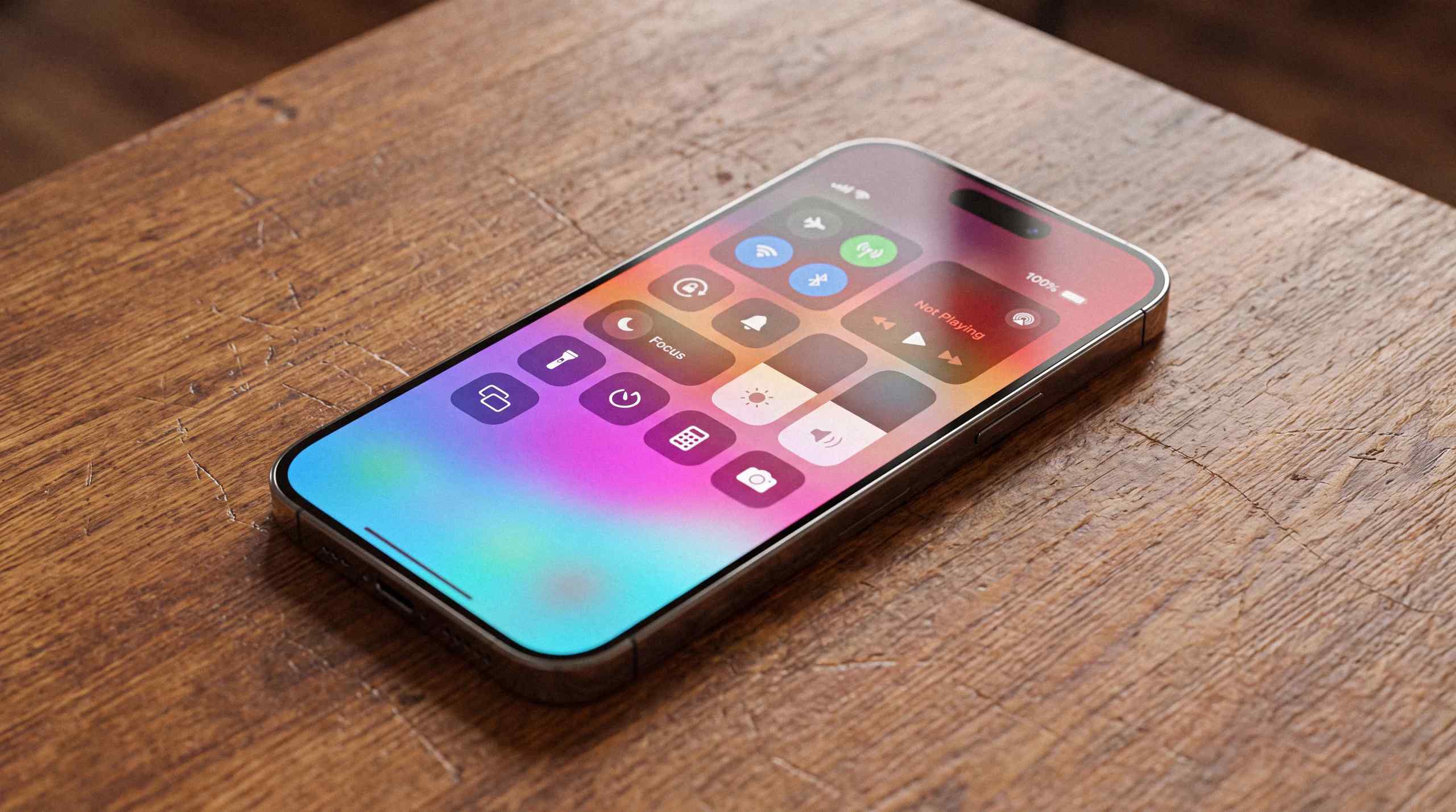 An iPhone set on a table with quick settings displayed.